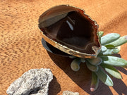 Brown Agate pop socket (popsocket) for use with iphone, androids, ipads, smartphones, and other small tecnical devices. Used for easy grip of electronics as well as a beautiful phone accessory. It is an attachment that easily tapes onto the back of the device and pops in and out as needed for use. These agate slices are natural and pure agate stones imported from Brazil of the highest quality and beautifylly gold dipped on the rim.