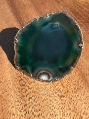 Green Agate pop socket (popsocket) for use with iphone, androids, ipads, smartphones and other small tecnical devices. Used for easy grip of electronics as well as a beautiful phone accessory. It is an attachment that easily tapes onto the back of the device and pops in and out as needed for use. These agate slices are natural and pure agate stones imported from Brazil of the highest quality and beautifylly gold dipped on the rim.