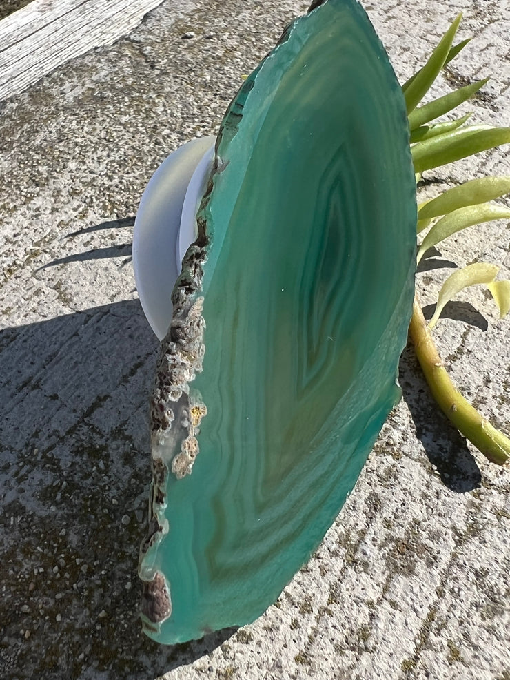 Green Agate pop socket (popsocket) for use with iphone, androids, ipads, smartphones and other small tecnical devices. Used for easy grip of electronics as well as a beautiful phone accessory. It is an attachment that easily tapes onto the back of the device and pops in and out as needed for use. These agate slices are natural and pure agate stones imported from Brazil of the highest quality with it&