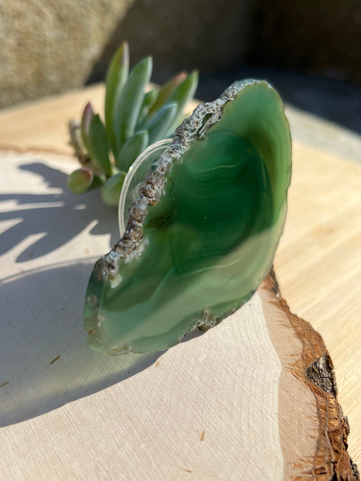 Green Agate pop socket (popsocket) for use with iphone, androids, ipads, smartphones and other small tecnical devices. Used for easy grip of electronics as well as a beautiful phone accessory. It is an attachment that easily tapes onto the back of the device and pops in and out as needed for use. These agate slices are natural and pure agate stones imported from Brazil of the highest quality with it&