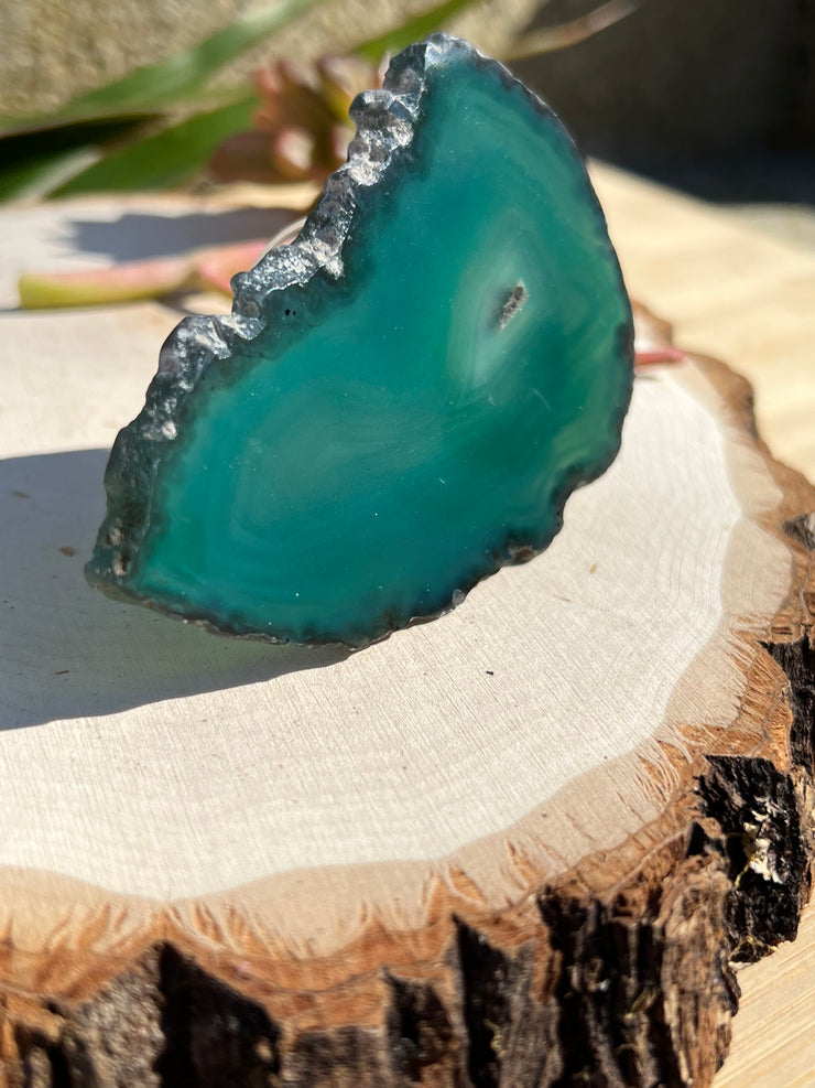 Green Agate pop socket (popsocket) for use with iphone, androids, ipads, smartphones and other small tecnical devices. Used for easy grip of electronics as well as a beautiful phone accessory. It is an attachment that easily tapes onto the back of the device and pops in and out as needed for use. These agate slices are natural and pure agate stones imported from Brazil of the highest quality with it&