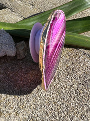 Pink Agate pop socket (popsocket) for use with iphone, androids, ipads, smartphones and other small tecnical devices. Used for easy grip of electronics as well as a beautiful phone accessory. It is an attachment that easily tapes onto the back of the device and pops in and out as needed for use. These agate slices are natural and pure agate stones imported from Brazil of the highest quality and beautifylly gold dipped on the rim.
