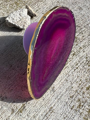 Pink Agate pop socket (popsocket) for use with iphone, androids, ipads, smartphones and other small tecnical devices. Used for easy grip of electronics as well as a beautiful phone accessory. It is an attachment that easily tapes onto the back of the device and pops in and out as needed for use. These agate slices are natural and pure agate stones imported from Brazil of the highest quality and beautifylly gold dipped on the rim.