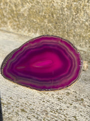 Pink Agate pop socket (popsocket) for use with iphone, androids, ipads, smartphones and other small tecnical devices. Used for easy grip of electronics as well as a beautiful phone accessory. It is an attachment that easily tapes onto the back of the device and pops in and out as needed for use. These agate slices are natural and pure agate stones imported from Brazil of the highest quality and beautifylly gold dipped on the rim.