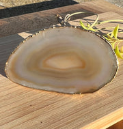 White Agate pop socket (popsocket) for use with iphone, androids, ipads, smartphones and other small tecnical devices. Used for easy grip of electronics as well as a beautiful phone accessory. It is an attachment that easily tapes onto the back of the device and pops in and out as needed for use. These agate slices are natural and pure agate stones imported from Brazil of the highest quality and beautifylly gold dipped on the rim.