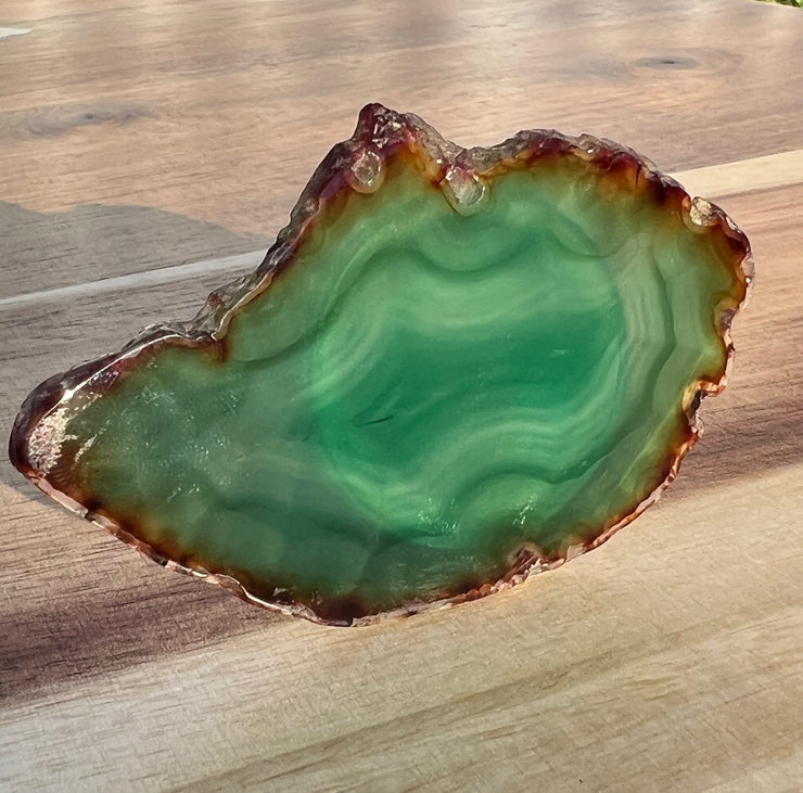 Green Agate pop socket (popsocket) for use with iphone, androids, ipads, smartphones and other small tecnical devices. Used for easy grip of electronics as well as a beautiful phone accessory. It is an attachment that easily tapes onto the back of the device and pops in and out as needed for use. These agate slices are natural and pure agate stones imported from Brazil of the highest quality with it&