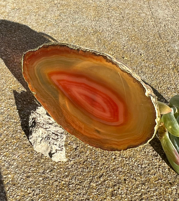 Pink Agate pop socket (popsocket) for use with iphone, androids, ipads, smartphones and other small tecnical devices. Used for easy grip of electronics as well as a beautiful phone accessory. It is an attachment that easily tapes onto the back of the device and pops in and out as needed for use. These agate slices are natural and pure agate stones imported from Brazil of the highest quality and beautifylly gold dipped on the rim.