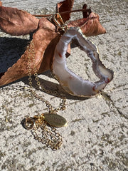 Natural Agate slice druzy necklace pendant, gold rimmed. Varies in hues, size, shape and tones. Comes with durable 14k gold filled chain length 16inches (41cm) and Elemant logo tag in gold attached by the clasp. Beautifully crafted natural agate stones in highest quality imported from Brazil.