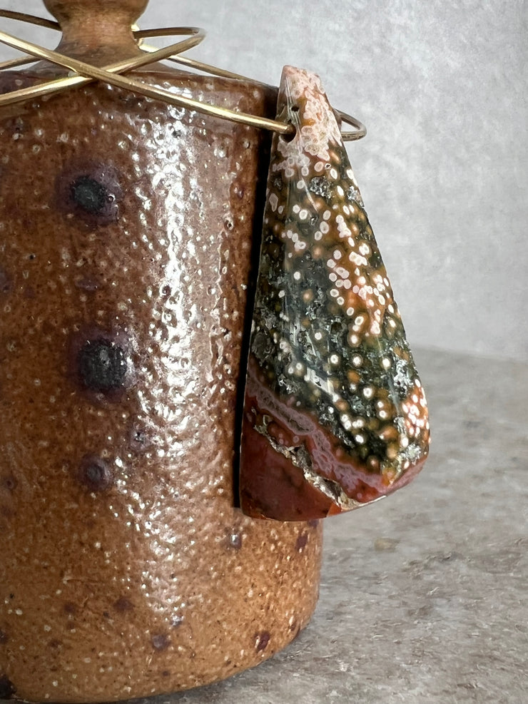Jasper stone on hoop earrings. Each stone has a unique natural patten and varies in color. These stones are about 2.5cm to 3.5 cm long and are very light, which makes them easy to wear. Every set of earrings are paired with hoops to match, please see main page for specifics.