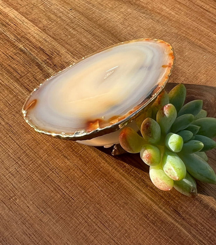 White Agate pop socket (popsocket) for use with iphone, androids, ipads, smartphones and other small tecnical devices. Used for easy grip of electronics as well as a beautiful phone accessory. It is an attachment that easily tapes onto the back of the device and pops in and out as needed for use. These agate slices are natural and pure agate stones imported from Brazil of the highest quality and beautifylly gold dipped on the rim.