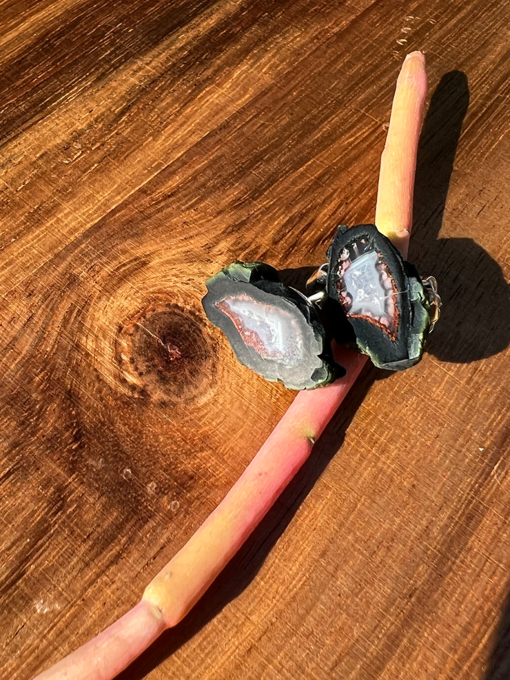 Druzy earrings with visible crystalized formations in naturally shaped variations of size, shape and color and 925 sterling silver stud backing.