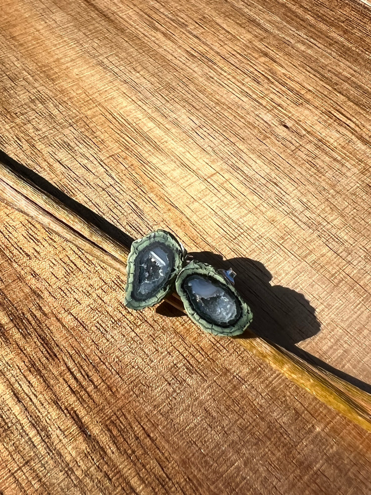 Druzy earrings with visible crystalized formations in naturally shaped variations of size, shape and color and 925 sterling silver stud backing.