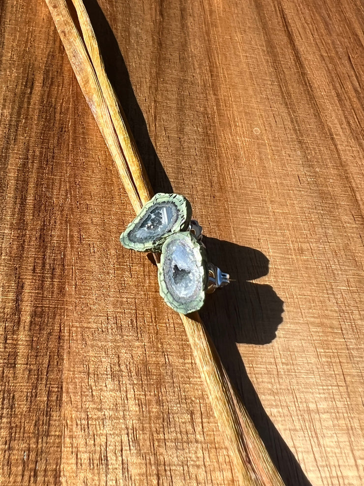 Druzy earrings with visible crystalized formations in naturally shaped variations of size, shape and color and 925 sterling silver stud backing.