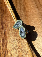 Druzy earrings with visible crystalized formations in naturally shaped variations of size, shape and color and 925 sterling silver stud backing.