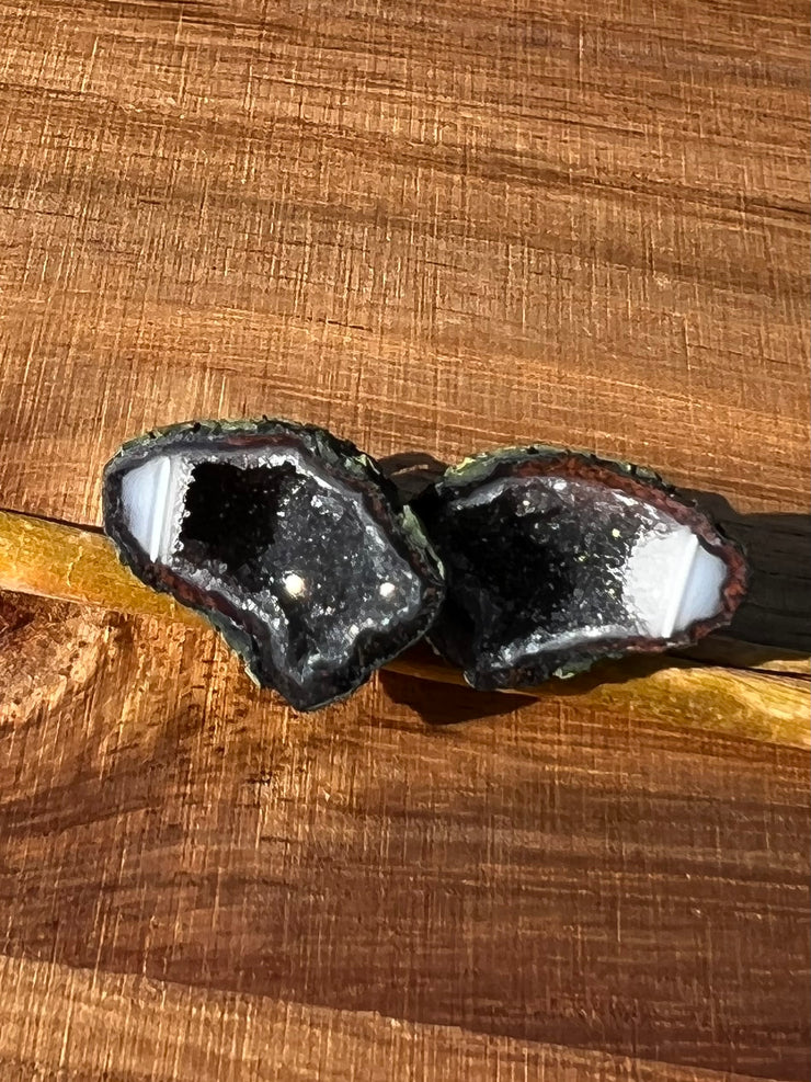 Druzy earrings with visible crystalized formations in naturally shaped variations of size, shape and color and 925 sterling silver stud backing.