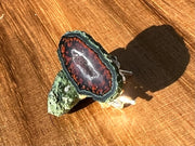 Druzy earrings with visible crystalized formations in naturally shaped variations of size, shape and color and 925 sterling silver stud backing. Picture included for size reference.