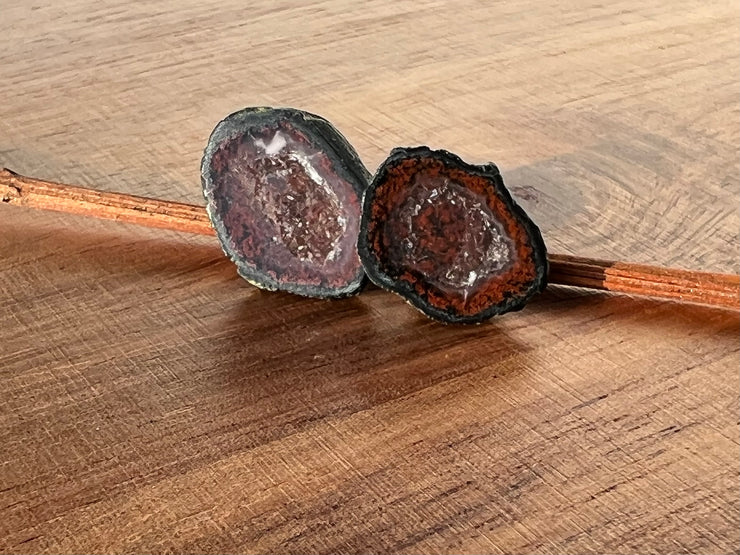 Druzy earrings with visible crystalized formations in naturally shaped variations of size, shape and color and 925 sterling silver stud backing.