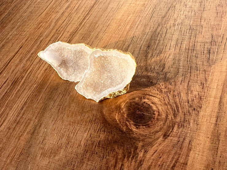Druzy earrings with visible crystalized formations in naturally shaped variations of size, shape and color and 925 sterling silver stud backing.