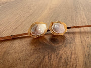 Druzy earrings with visible crystalized formations in naturally shaped variations of size, shape and color and 925 sterling silver stud backing.Druzy earrings with visible crystalized formations in naturally shaped variations of size, shape and color and 925 sterling silver stud backing.