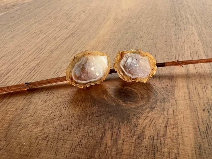 Druzy earrings with visible crystalized formations in naturally shaped variations of size, shape and color and 925 sterling silver stud backing.Druzy earrings with visible crystalized formations in naturally shaped variations of size, shape and color and 925 sterling silver stud backing.