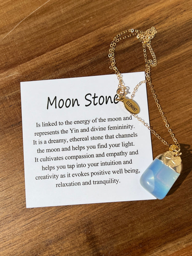 Moon Stone pendant with silver dollar charm on a 16inch 14k gold filled chain. Moon stone represents yin and is related to the moon cycles. Enjoy this stone as it helps you tap into your intuition and light.