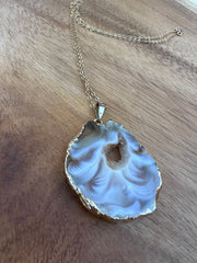 Natural Agate slice druzy necklace pendant, gold rimmed.  Varies in hues, size, shape and tones.  Comes with durable 24k gold filled chain length 16inches (41cm) and Elemant logo tag in gold attached by the clasp.  Beautifully crafted natural agate stones in highest quality imported from Brazil.