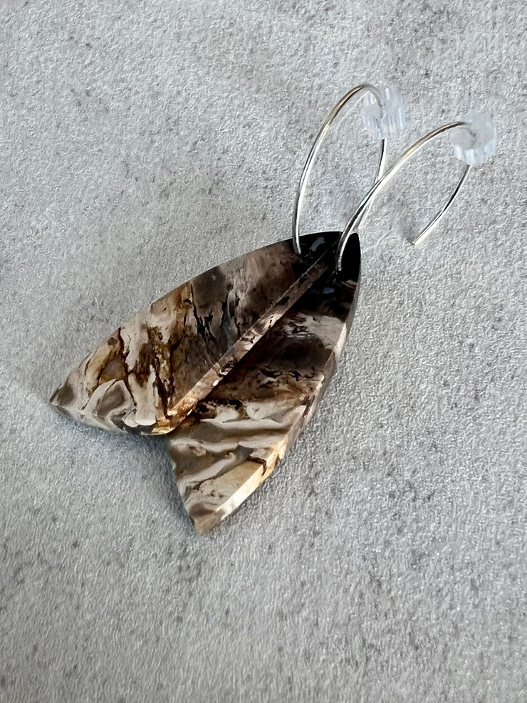 Palm Root stone on hoop earrings. Each stone has a unique natural patten and varies in color. These stones are about 2.5cm to 3.5 cm long and are very light, which makes them easy to wear. Every set of earrings are paired with hoops to match, please see main page for specifics.