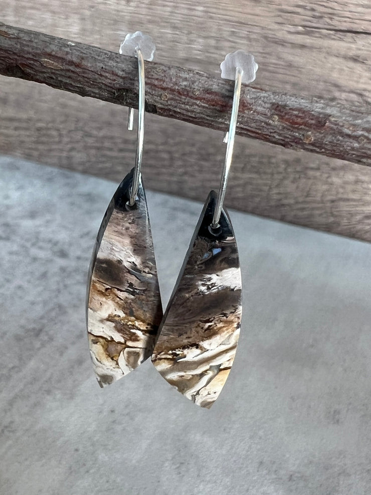 Palm Root stone on hoop earrings. Each stone has a unique natural patten and varies in color. These stones are about 2.5cm to 3.5 cm long and are very light, which makes them easy to wear. Every set of earrings are paired with hoops to match, please see main page for specifics.