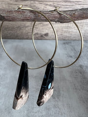Palm Root stone on hoop earrings. Each stone has a unique natural patten and varies in color. These stones are about 2.5cm to 3.5 cm long and are very light, which makes them easy to wear. Every set of earrings are paired with hoops to match, please see main page for specifics.