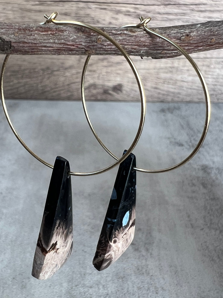 Palm Root stone on hoop earrings. Each stone has a unique natural patten and varies in color. These stones are about 2.5cm to 3.5 cm long and are very light, which makes them easy to wear. Every set of earrings are paired with hoops to match, please see main page for specifics.