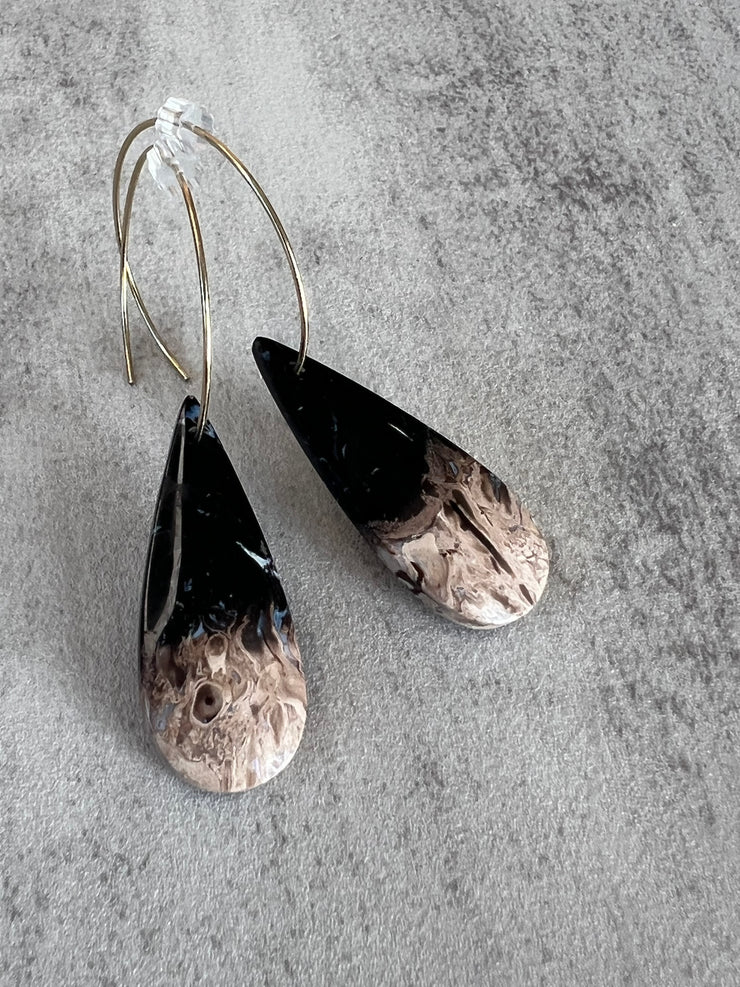 Palm Root stone on hoop earrings. Each stone has a unique natural patten and varies in color. These stones are about 2.5cm to 3.5 cm long and are very light, which makes them easy to wear. Every set of earrings are paired with hoops to match, please see main page for specifics.