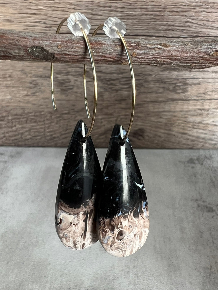 Palm Root stone on hoop earrings. Each stone has a unique natural patten and varies in color. These stones are about 2.5cm to 3.5 cm long and are very light, which makes them easy to wear. Every set of earrings are paired with hoops to match, please see main page for specifics.