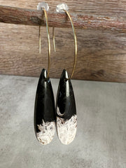 Palm Root stone on hoop earrings. Each stone has a unique natural patten and varies in color. These stones are about 2.5cm to 3.5 cm long and are very light, which makes them easy to wear. Every set of earrings are paired with hoops to match, please see main page for specifics.