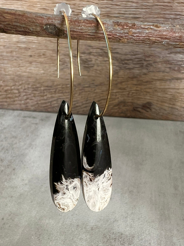 Palm Root stone on hoop earrings. Each stone has a unique natural patten and varies in color. These stones are about 2.5cm to 3.5 cm long and are very light, which makes them easy to wear. Every set of earrings are paired with hoops to match, please see main page for specifics.