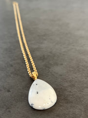 Opal Necklace Pendant with 14k gold chain and small Elemant logo attached at the clasp