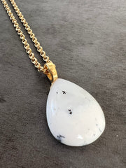 Opal Necklace Pendant with 14k gold chain and small Elemant logo attached at the clasp