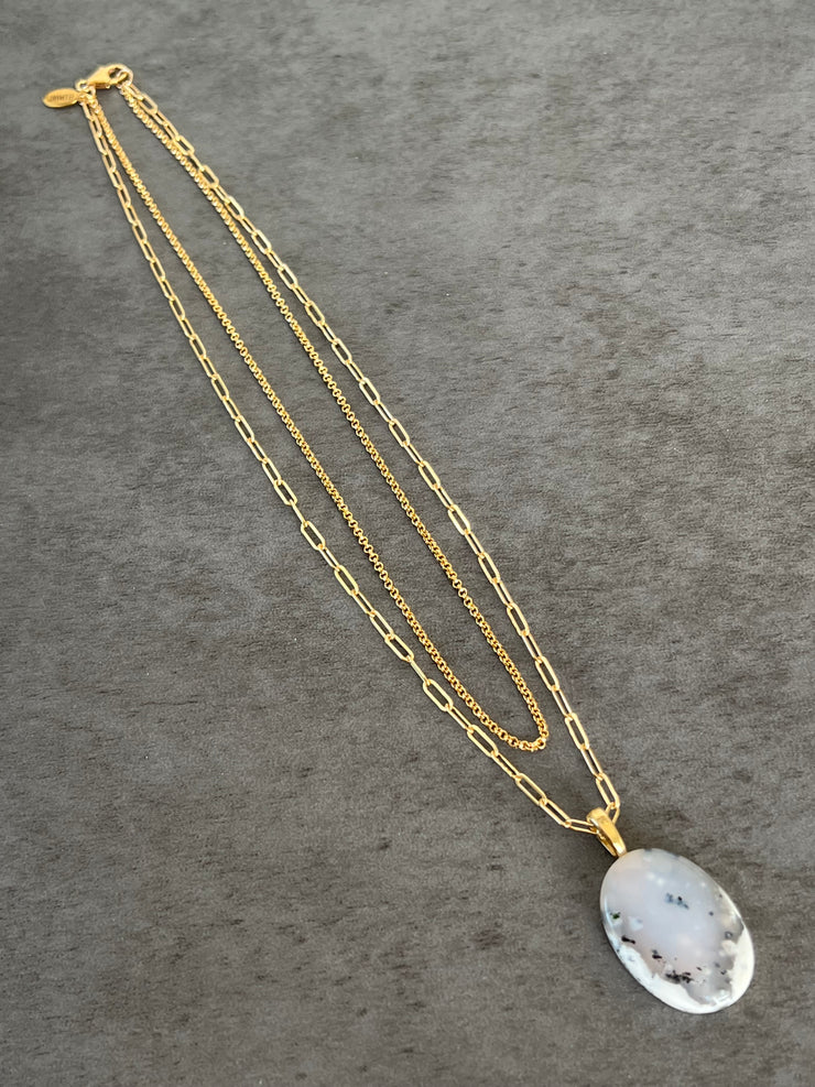 Opal Necklace Pendant with double 14k gold chains and small Elemant logo attached at the clasp.