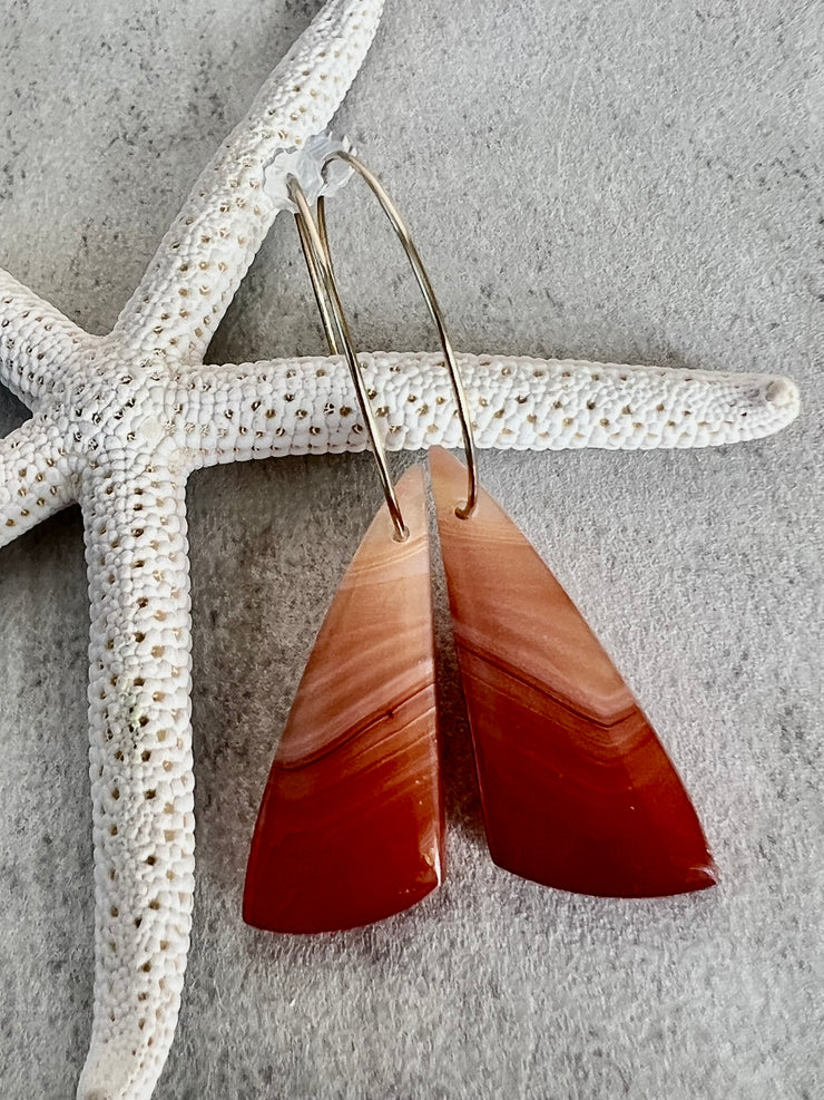Carnelian stone on hoop earrings. Each stone has a unique natural patten and varies in color. These stones are about 2.5cm to 3.5 cm long and are very light, which makes them easy to wear. Every set of earrings are paired with hoops to match, please see main page for specifics.
