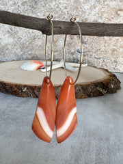 Carnelian stone on hoop earrings. Each stone has a unique natural patten and varies in color. These stones are about 2.5cm to 3.5 cm long and are very light, which makes them easy to wear. Every set of earrings are paired with hoops to match, please see main page for specifics.