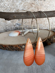 Carnelian stone on hoop earrings. Each stone has a unique natural patten and varies in color. These stones are about 2.5cm to 3.5 cm long and are very light, which makes them easy to wear. Every set of earrings are paired with hoops to match, please see main page for specifics.