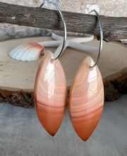 Carnelian stone on hoop earrings. Each stone has a unique natural patten and varies in color. These stones are about 2.5cm to 3.5 cm long and are very light, which makes them easy to wear. Every set of earrings are paired with hoops to match, please see main page for specifics.