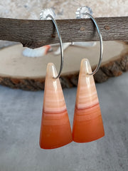 Carnelian stone on hoop earrings. Each stone has a unique natural patten and varies in color. These stones are about 2.5cm to 3.5 cm long and are very light, which makes them easy to wear. Every set of earrings are paired with hoops to match, please see main page for specifics.