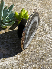 Black Agate pop socket (popsocket) for use with iphone, androids, ipads, and other small tecnical devices. Used for easy grip of electronics as well as a beautiful phone accessory. It is an attachment that easily tapes onto the back of the device and pops in and out as needed for use. These agate slices are natural and pure agate stones imported from Brazil of the highest quality and beautifylly gold dipped on the rim.